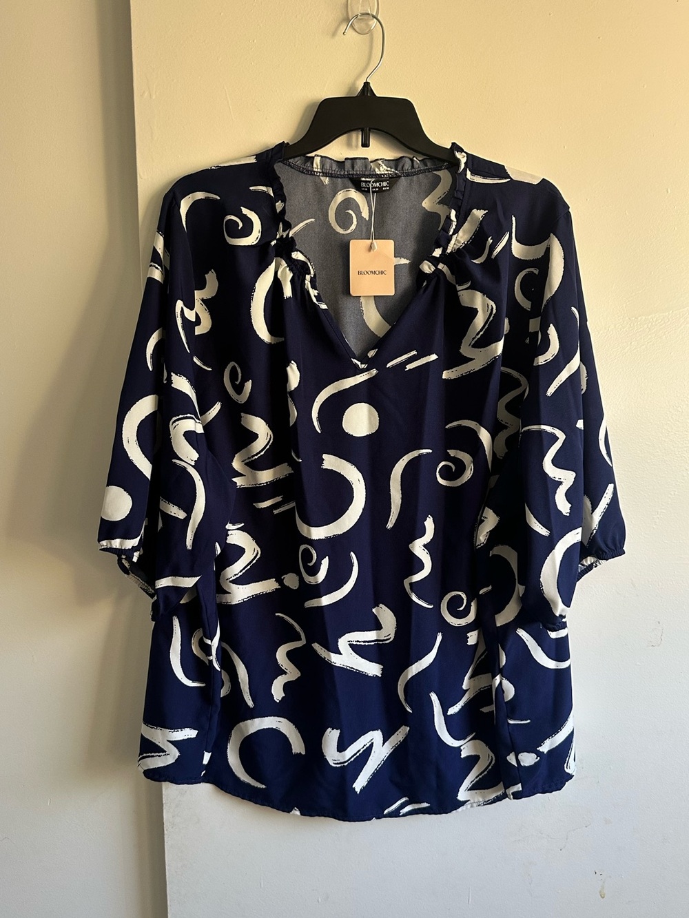 BloomChic Navy with White Abstract Ruffle V-Neck Blouse